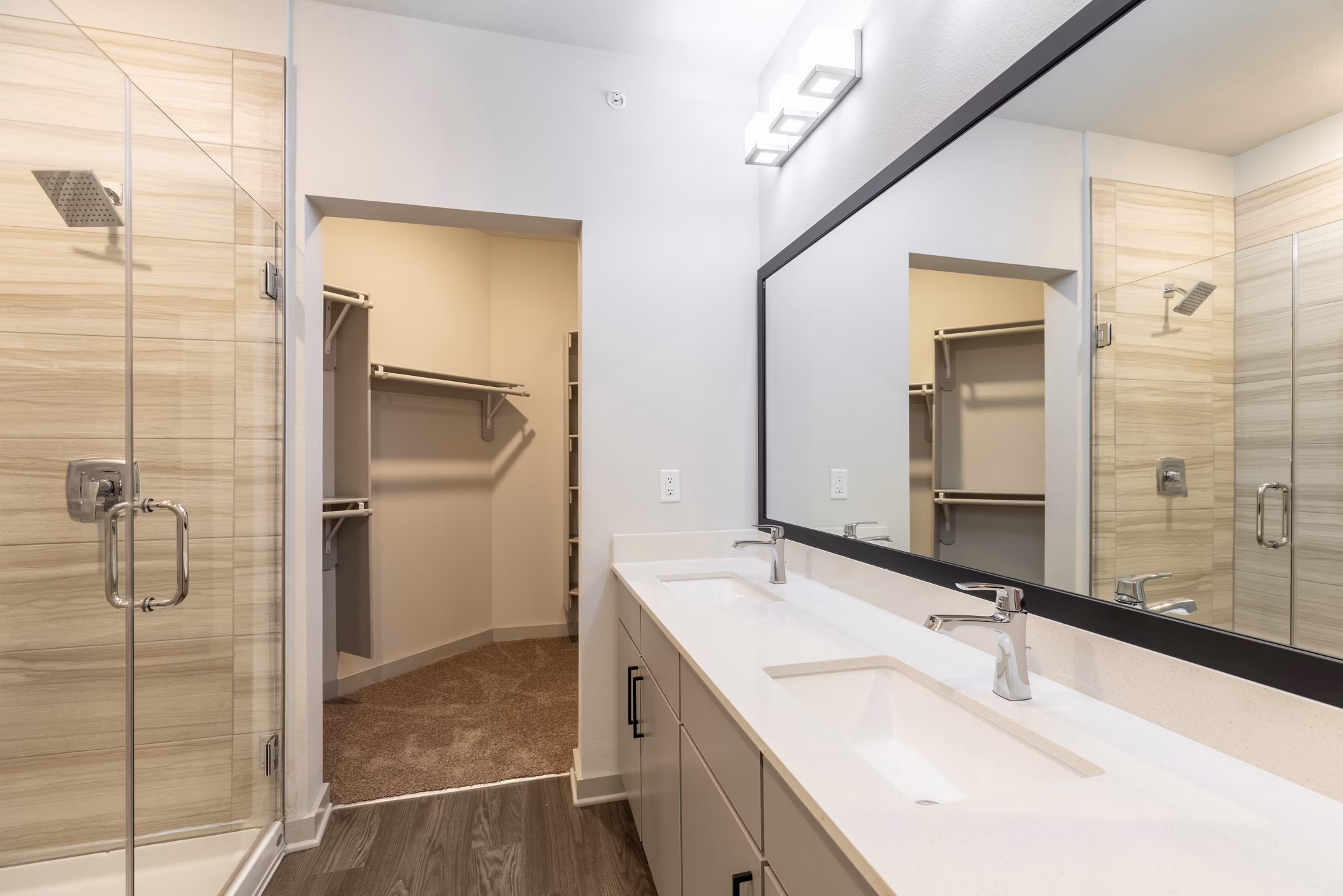 Bathroom with sleek fixtures and modern design at Five810 Southlands Apartments