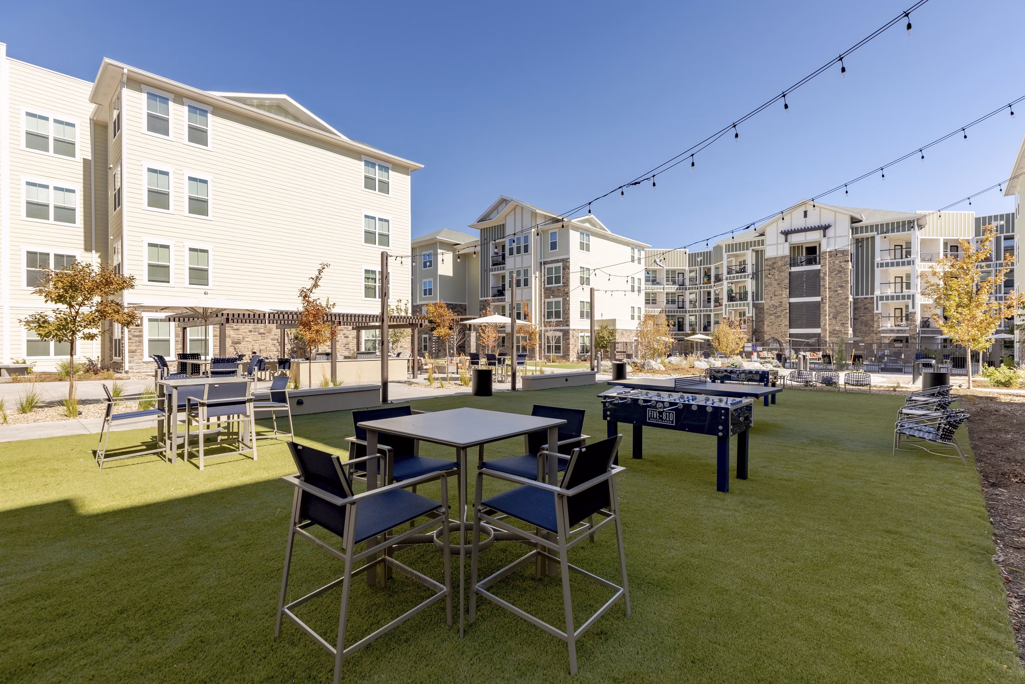 Five810 Southlands Apartments: Lush courtyard with seating areas and greenery for relaxation