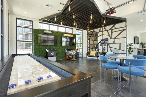 Modern clubhouse mail room with secure parcel lockers at Mezz at Fiddler's Green Apartments