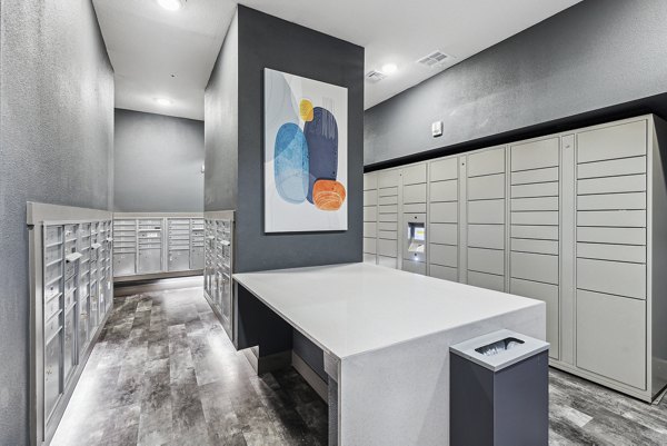 Mezz at Fiddler's Green: Elegant clubhouse interior with modern furnishings and natural light in luxury apartments