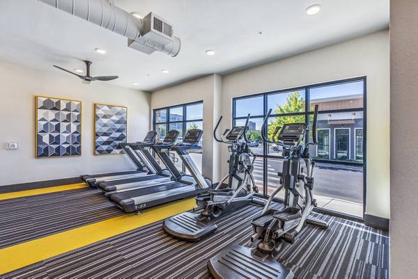 fitness center at Mezz at Fiddler's Green Apartments