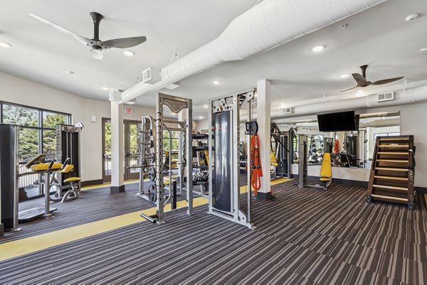 State-of-the-art spin studio with modern equipment at Mezz at Fiddler's Green Apartments