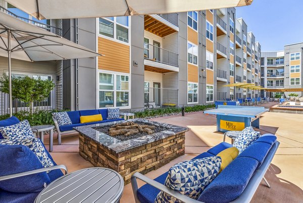fire pit/patio at Mezz at Fiddler's Green Apartments