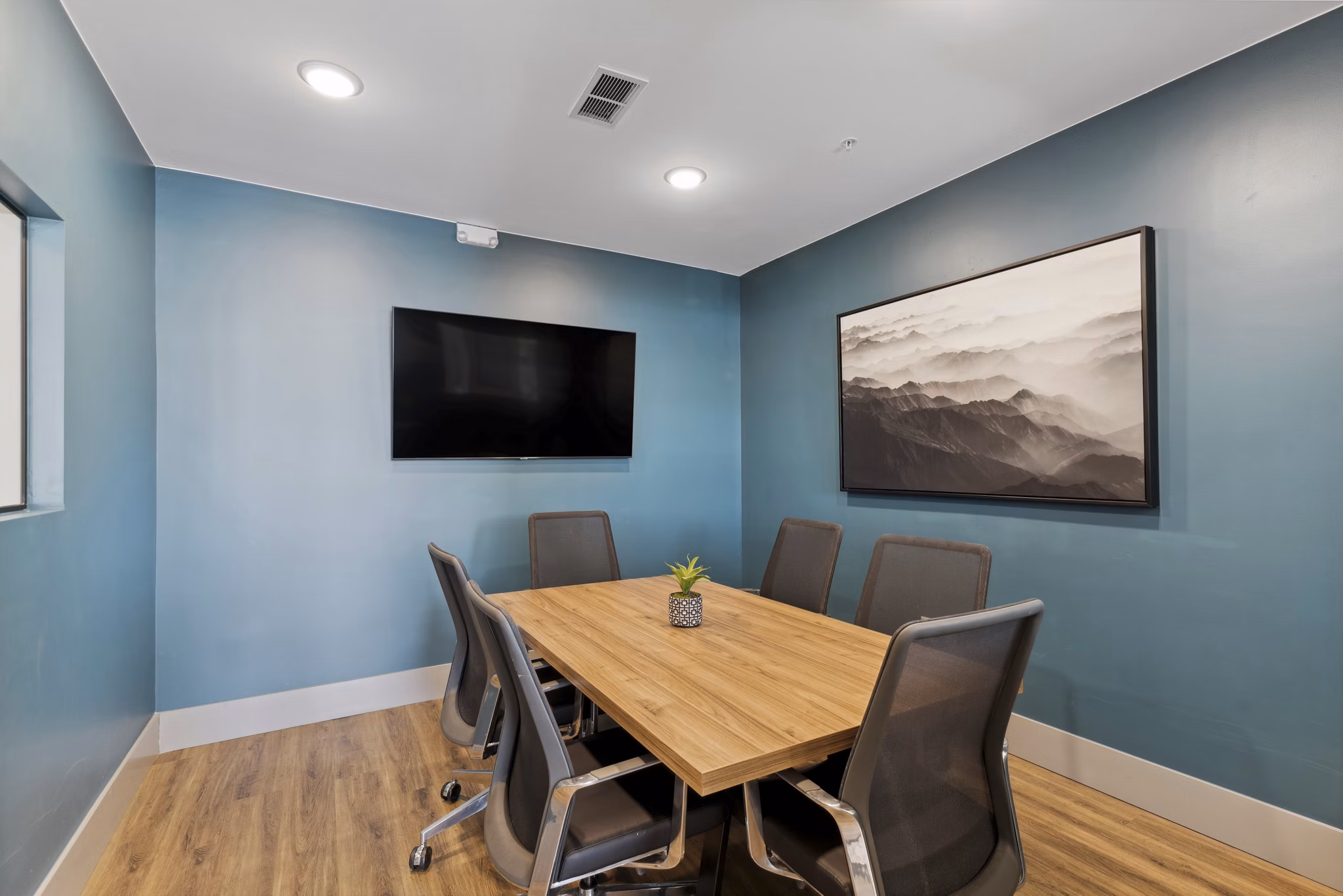 Modern meeting facility with stylish furnishings at Talus Flats Apartments