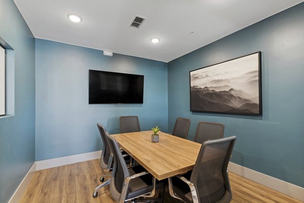 Modern meeting facility with stylish furnishings at Talus Flats Apartments