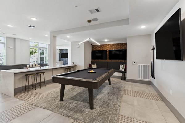 Clubhouse with modern furnishings at Talus Flats Apartments, offering luxury living spaces for residents