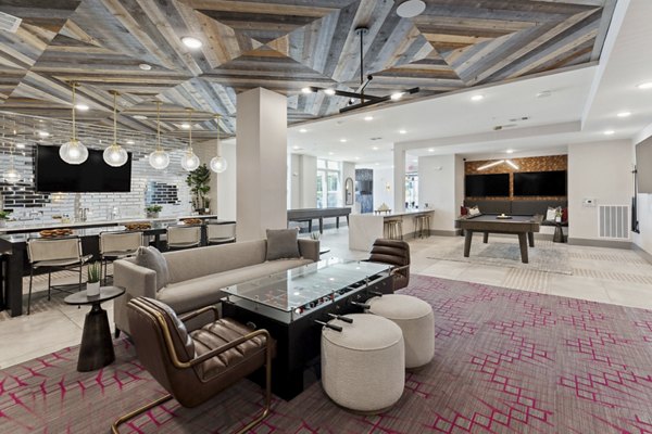 Modern clubhouse with cozy seating areas at Talus Flats Apartments for luxury living near Greystar communities