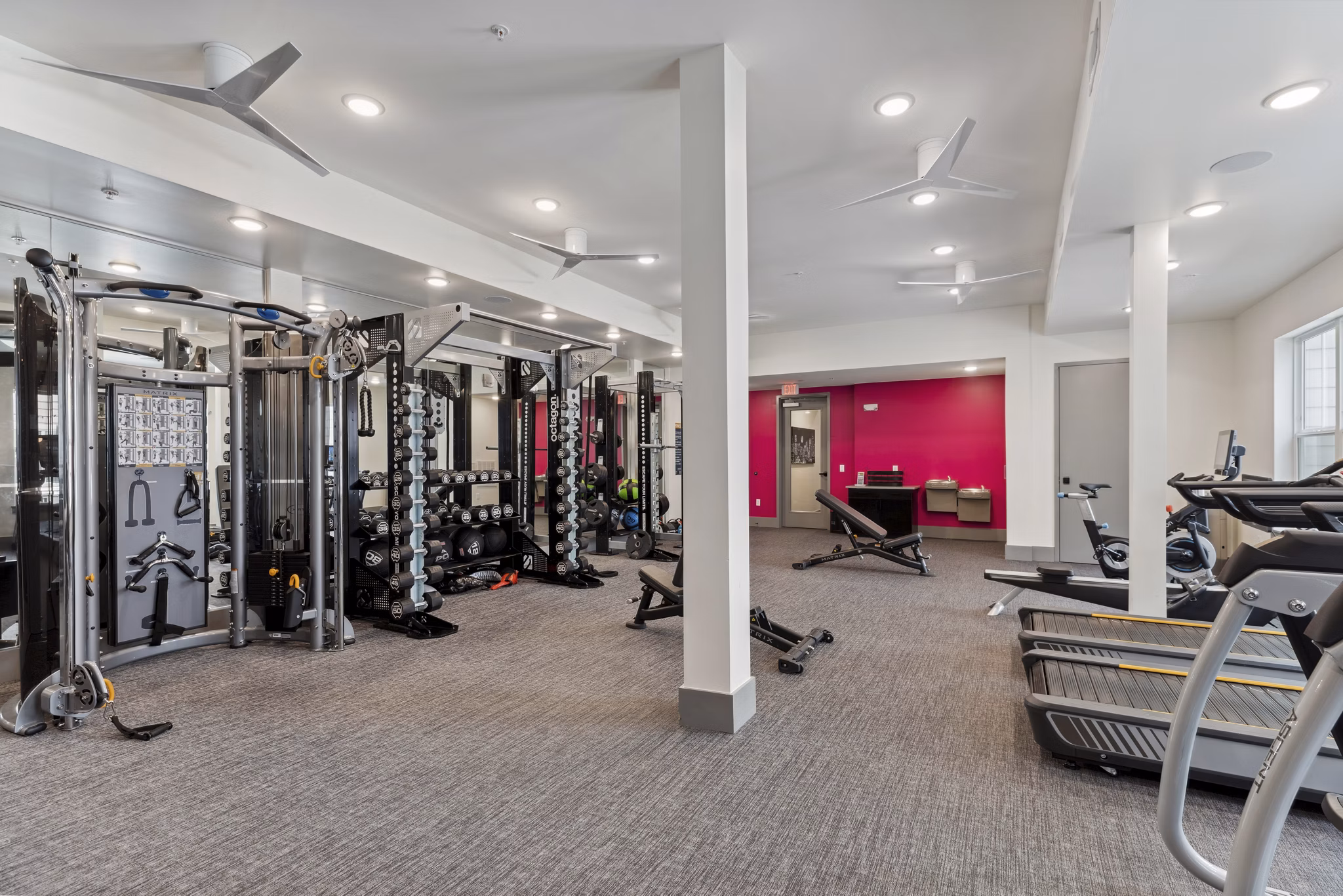 Talus Flats Apartments: Modern fitness center with state-of-the-art equipment and spacious workout areas