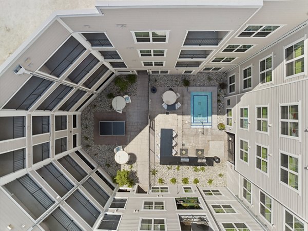 Scenic city view from a luxury high-rise balcony at Talus Flats Apartments