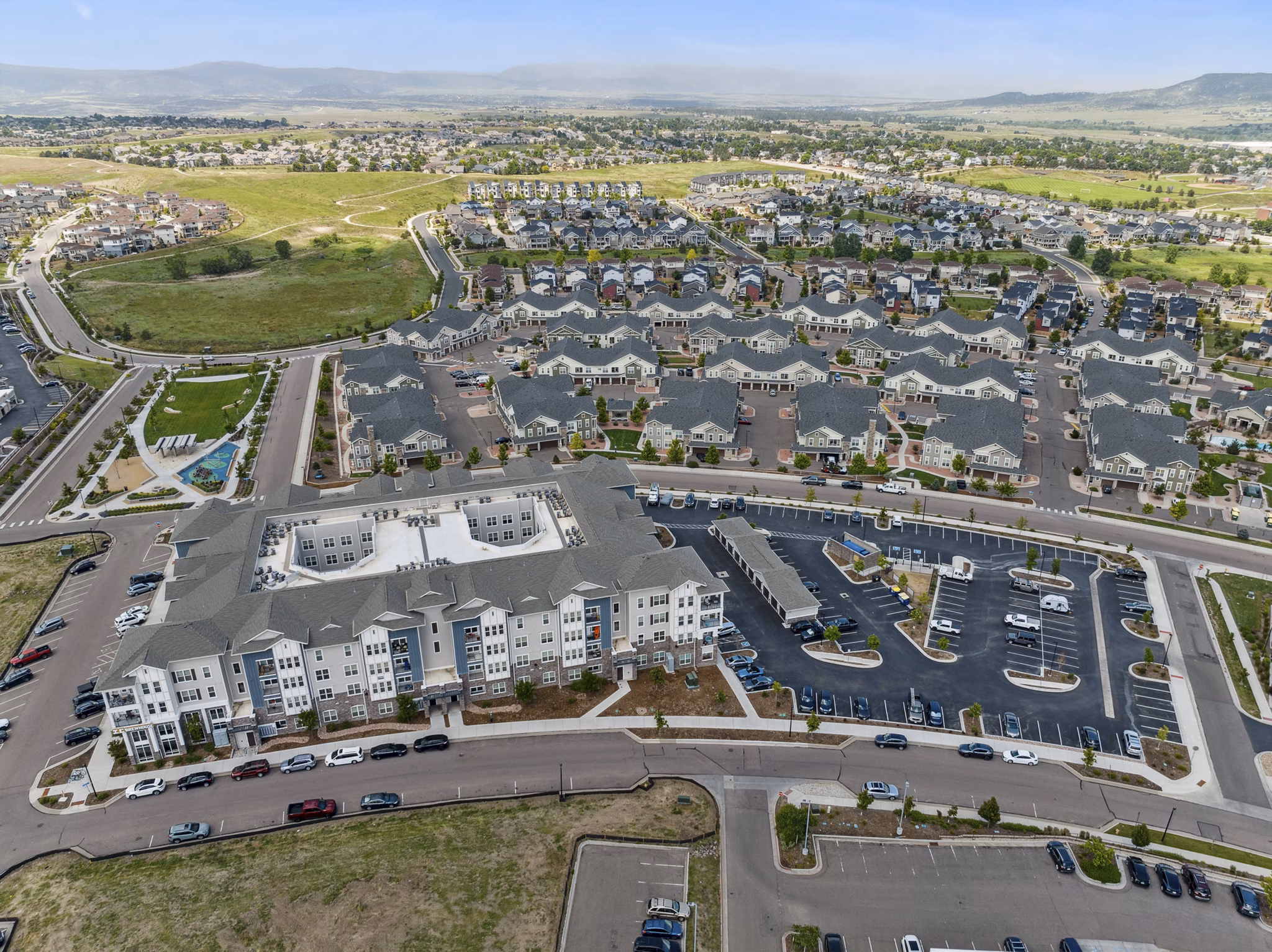 Scenic view from Talus Flats Apartments showcasing lush landscapes and city skyline