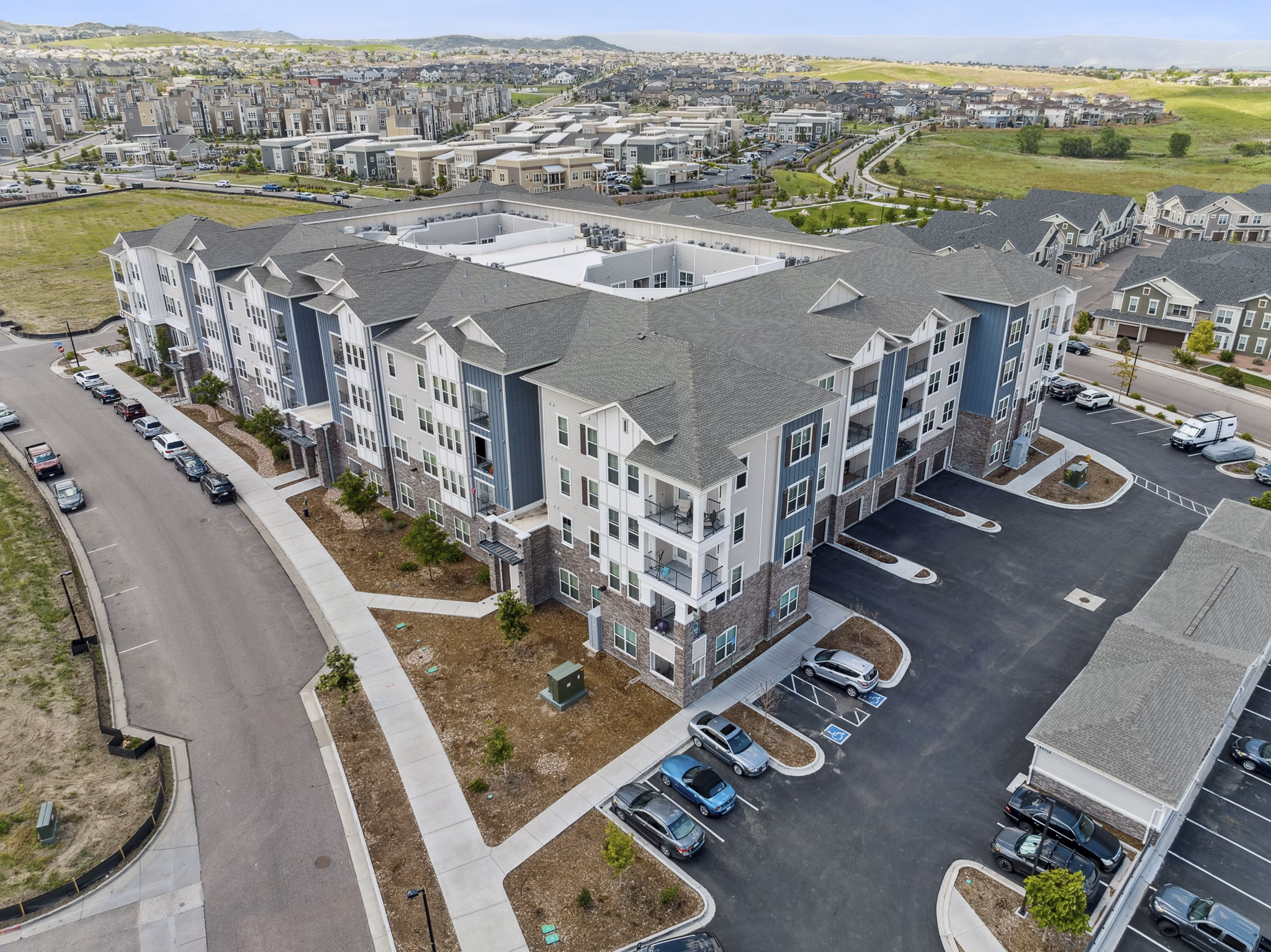 Talus Flats Apartments: Scenic mountain view from luxury apartments in vibrant urban setting