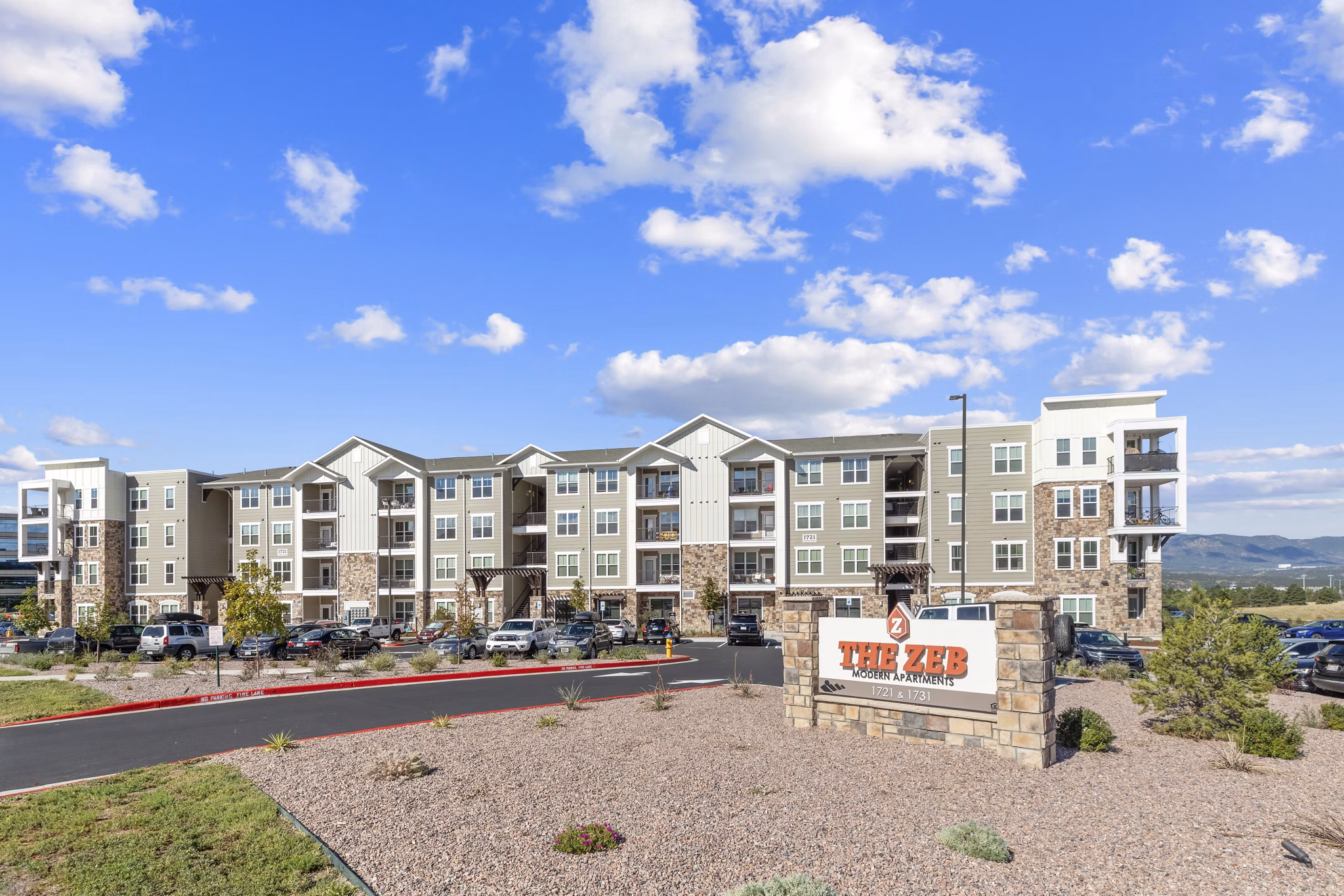 The Zeb Apartments: Upscale faÃ§ade at luxury apartments in vibrant downtown area