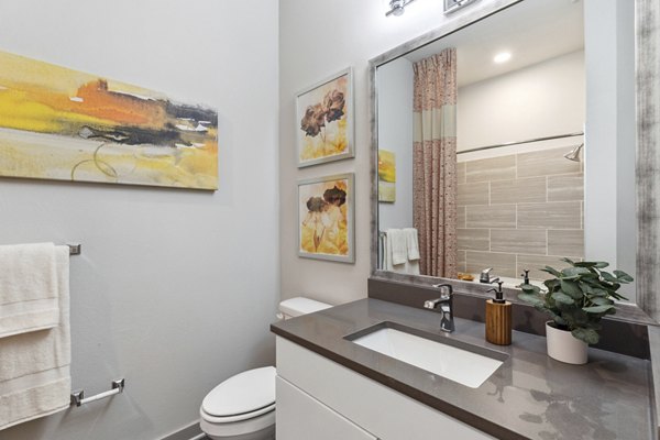 Modern bathroom with sleek fixtures at The Zeb Apartments offering luxury living in prime location