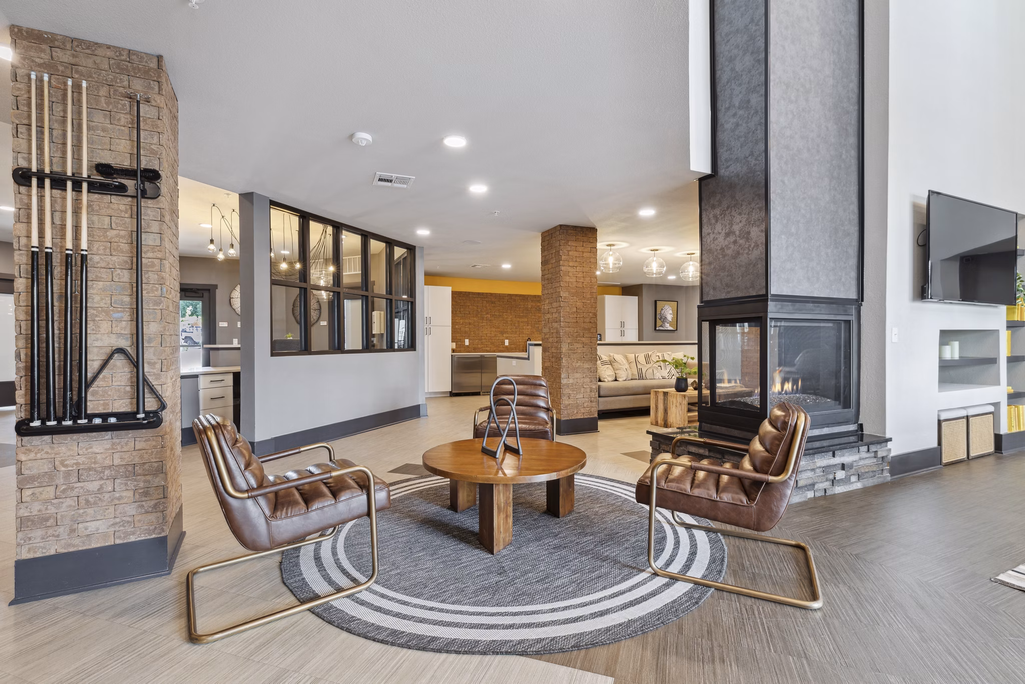 Clubhouse featuring modern lounge and entertainment area at The Zeb Apartments
