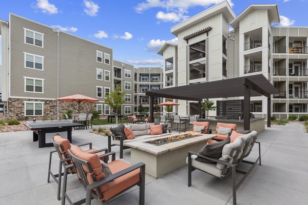 The Zeb Apartments: Cozy outdoor fire pit for luxury living