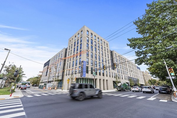 Contemporary facade of luxury high-rise building at The Clark Apartments in vibrant urban setting