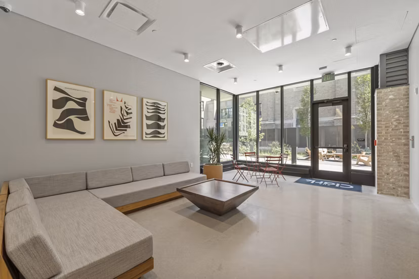 Clubhouse with modern seating and open space at The Clark Apartments, Portland luxury living