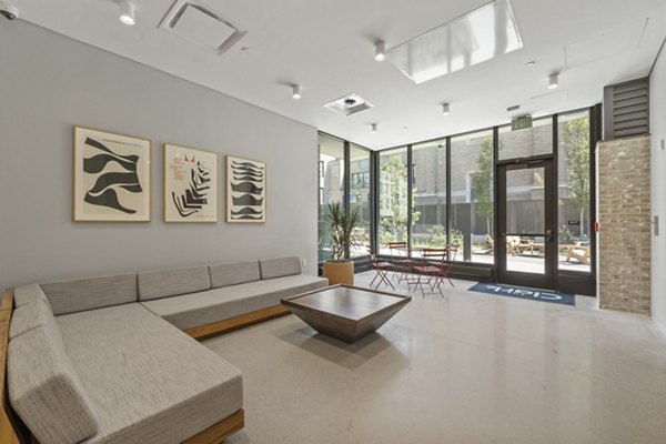 Clubhouse with modern seating and open space at The Clark Apartments, Portland luxury living