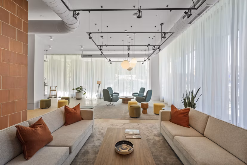 Elegant clubhouse with modern furnishings at The Clark Apartments