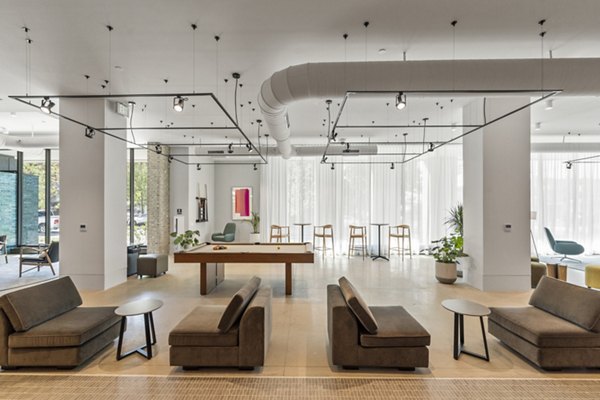 Clubhouse with stylish seating and modern decor at The Clark Apartments, a luxury living destination