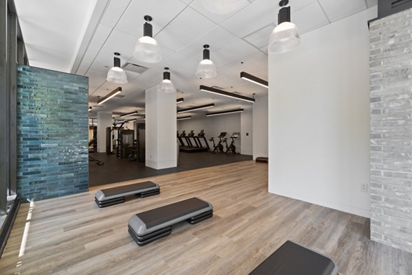 State-of-the-art fitness center with modern equipment at The Clark Apartments in Chicago, offering luxurious amenities for a premium lifestyle