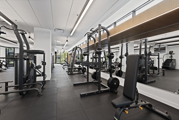 State-of-the-art fitness center with modern equipment at The Clark Apartments