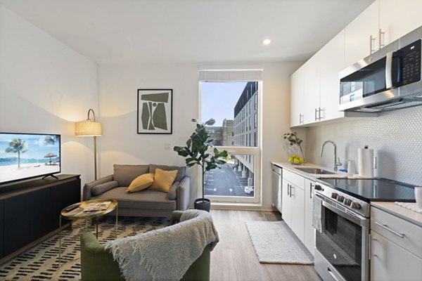 Spacious kitchen with modern appliances at The Clark Apartments