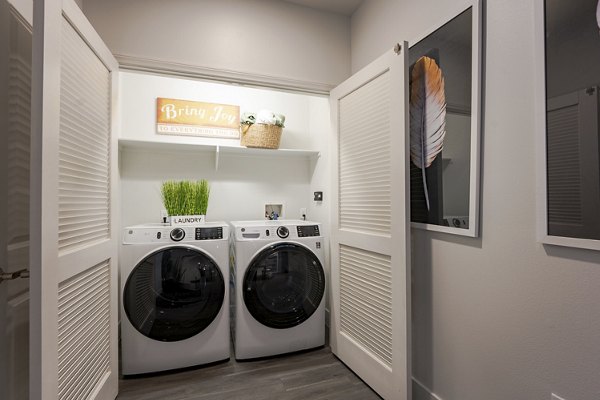 laundry room at Ariva Apartments