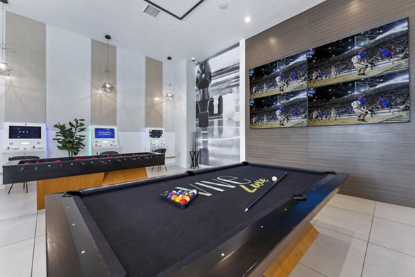 clubhouse game room at Vive Luxe Apartments