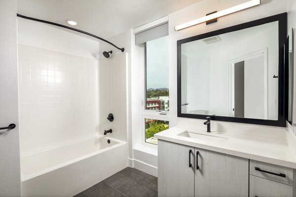 Spacious bathroom with modern fixtures at Vora Lux Apartments, a luxury property