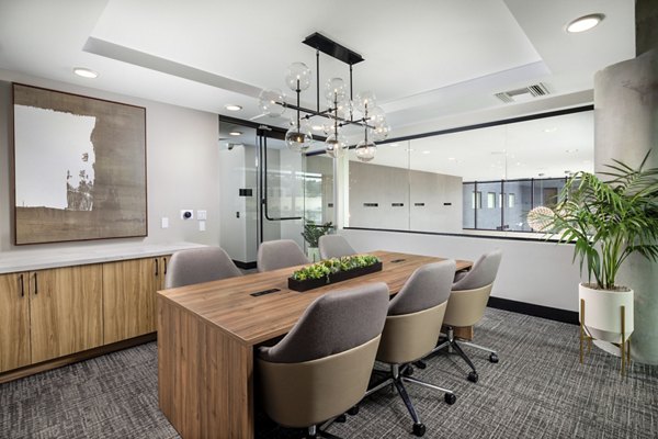 Vora Lux Apartments: Elegant clubhouse showcasing modern design and cozy seating areas