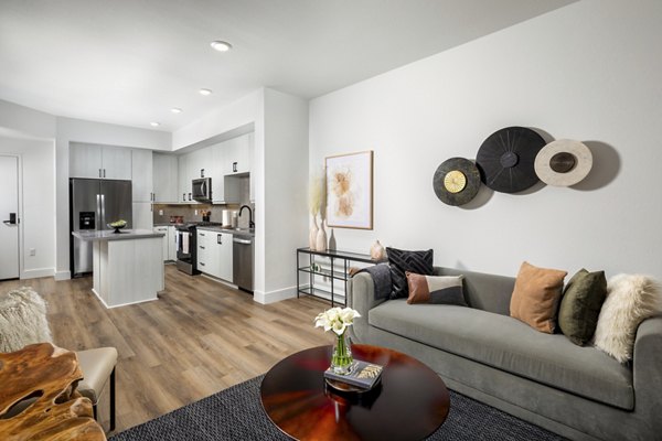 Spacious living room with contemporary decor in Vora Lux Apartments