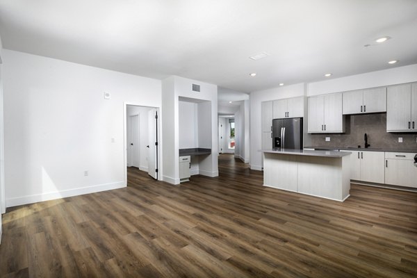 Modern living room with contemporary furnishings at Vora Lux Apartments, featuring stylish design and comfort