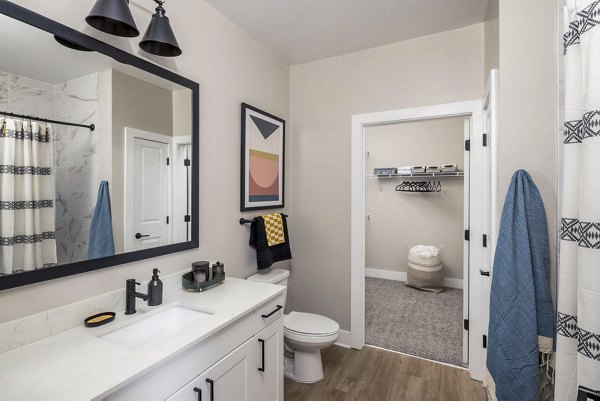 Modern bathroom with sleek fixtures at Broadstone 2Thirty Apartments, luxury living in a prime location