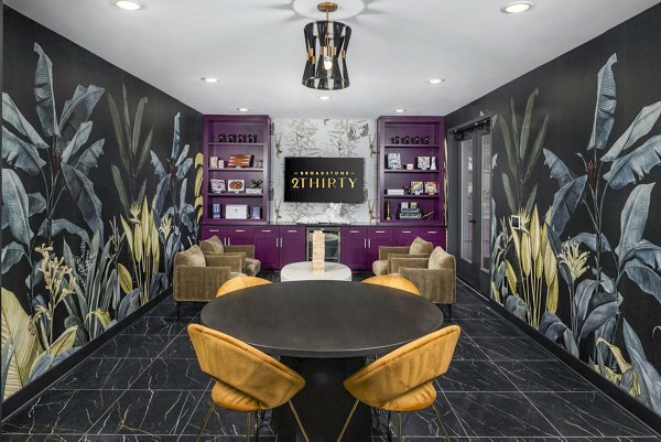 Contemporary clubhouse lounge with modern decor at Broadstone 2Thirty Apartments