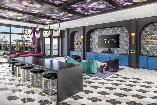 Modern clubhouse lobby with sleek furnishings at Broadstone 2Thirty Apartments
