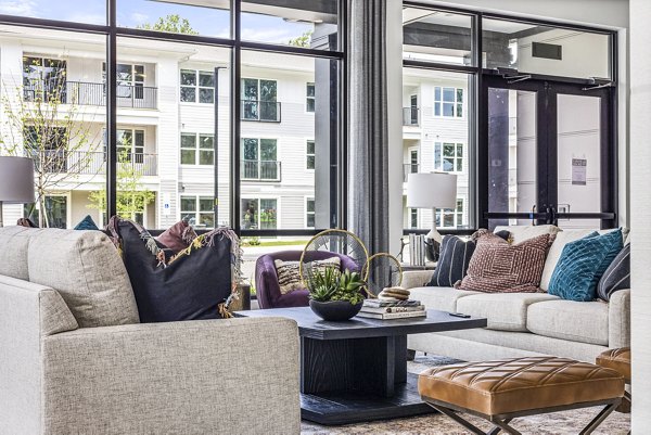 Stylish clubhouse with modern lounge seating in Everly on 401 Apartments lobby