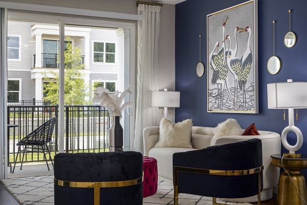 Contemporary living room with stylish decor at Everly on 401 Apartments