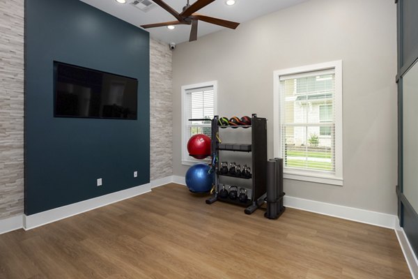 fitness center at The Alexandria Apartments 