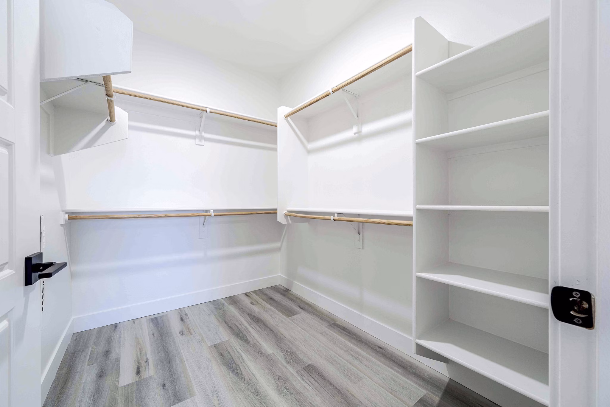Modern bedroom closet with ample storage in Slate Scottsdale Apartments