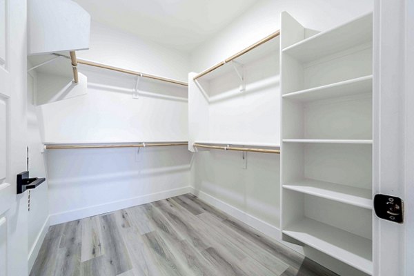 Modern bedroom closet with ample storage in Slate Scottsdale Apartments