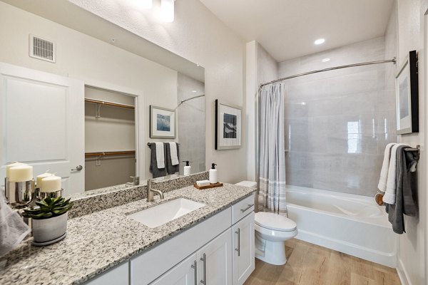Birchway Perry Road Apartments: Modern bathroom with sleek fixtures and elegant design details
