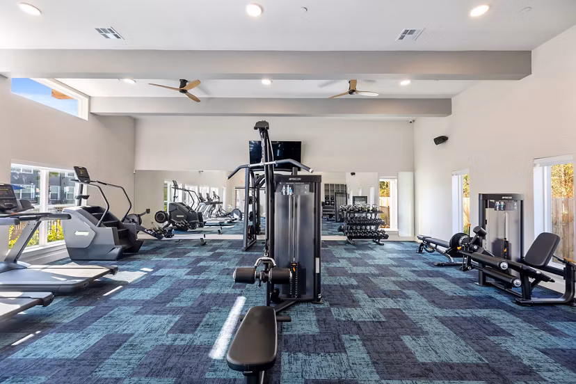 State-of-the-art fitness center with modern equipment at Birchway Perry Road Apartments
