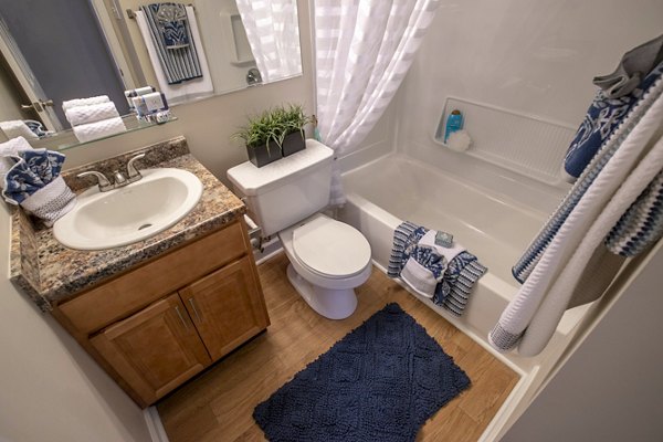 Bathroom featuring modern fixtures at Collins Crossing Apartments