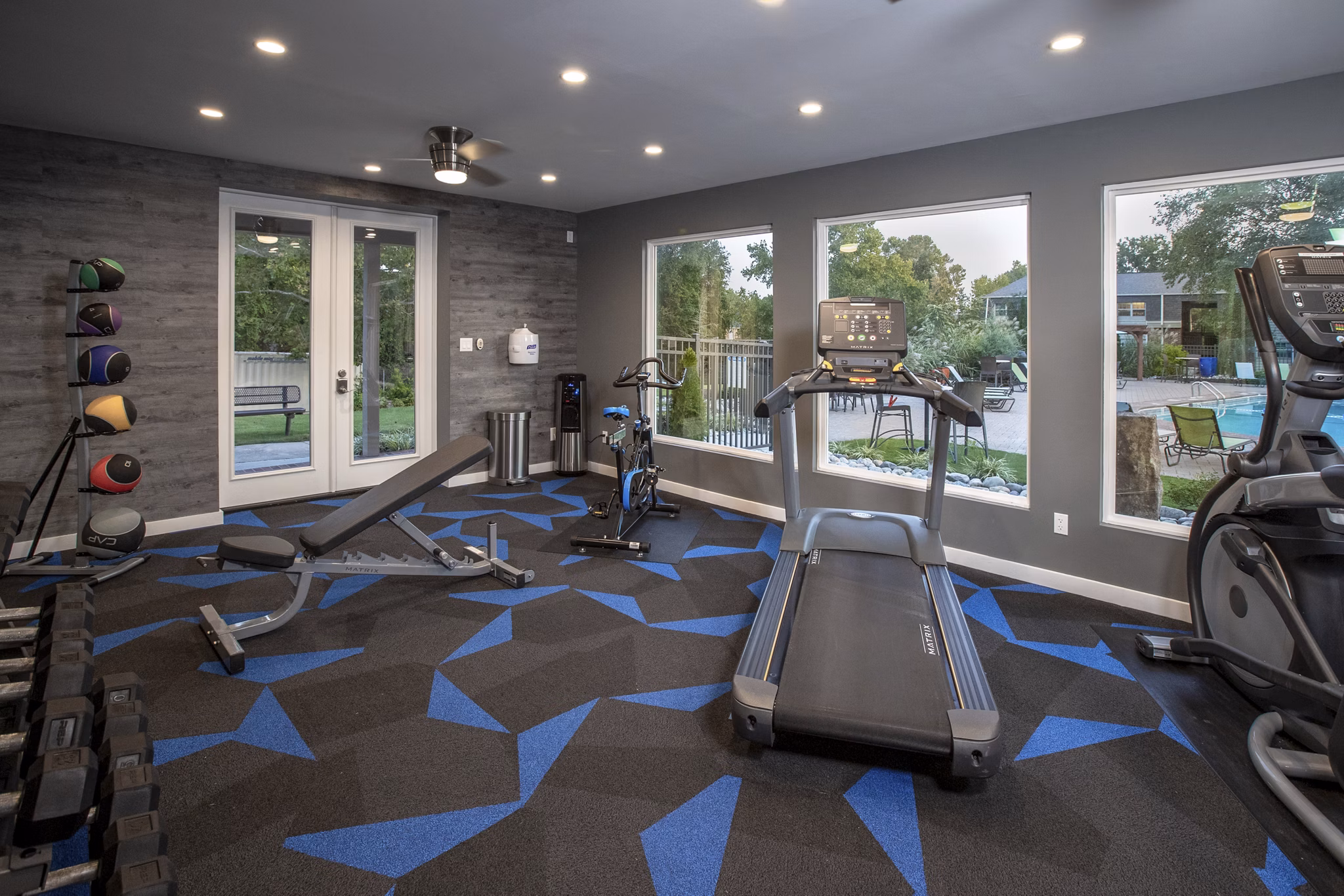 State-of-the-art fitness center with modern equipment at Collins Crossing Apartments