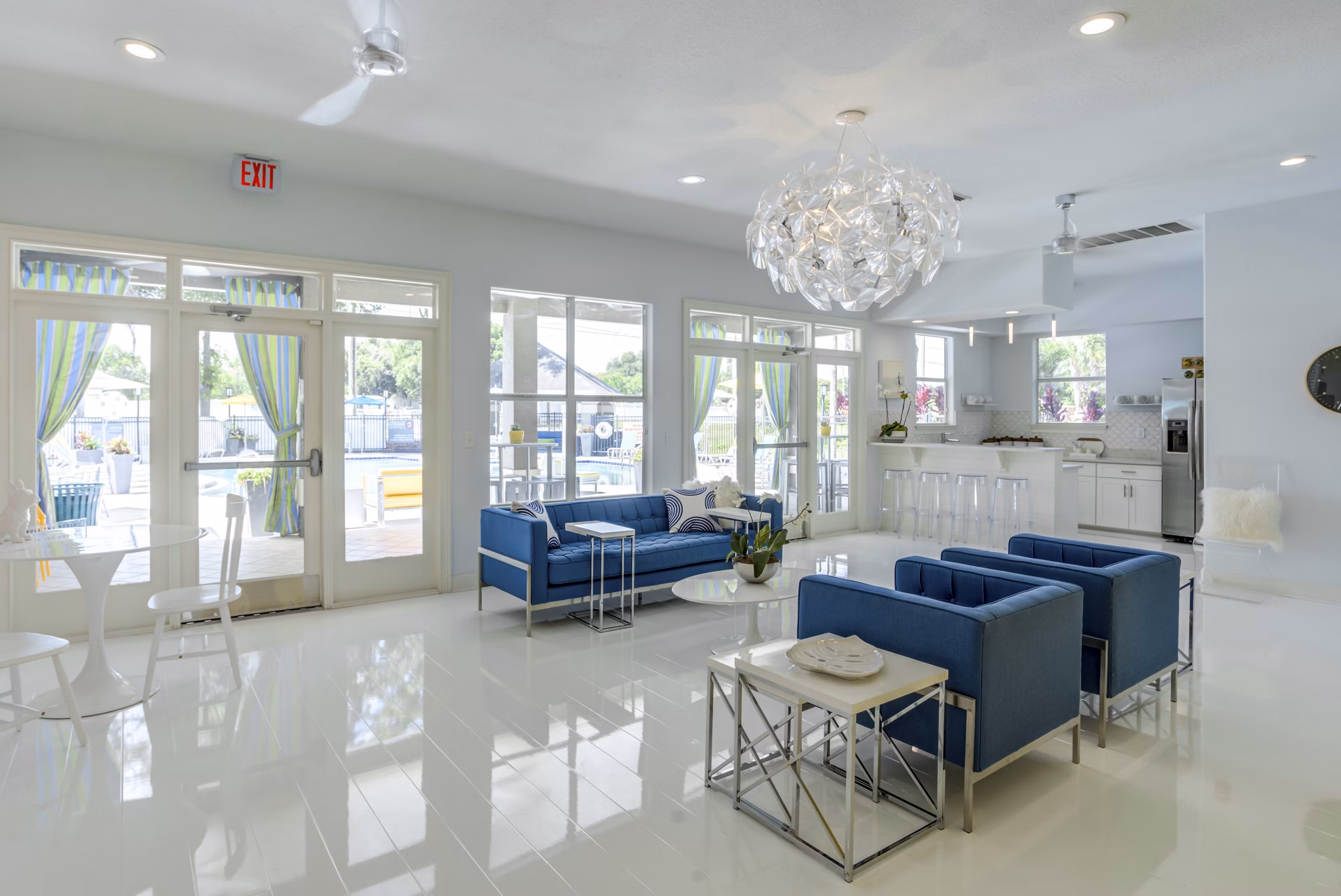 Clubhouse featuring modern design and communal seating at Fusion Apartments