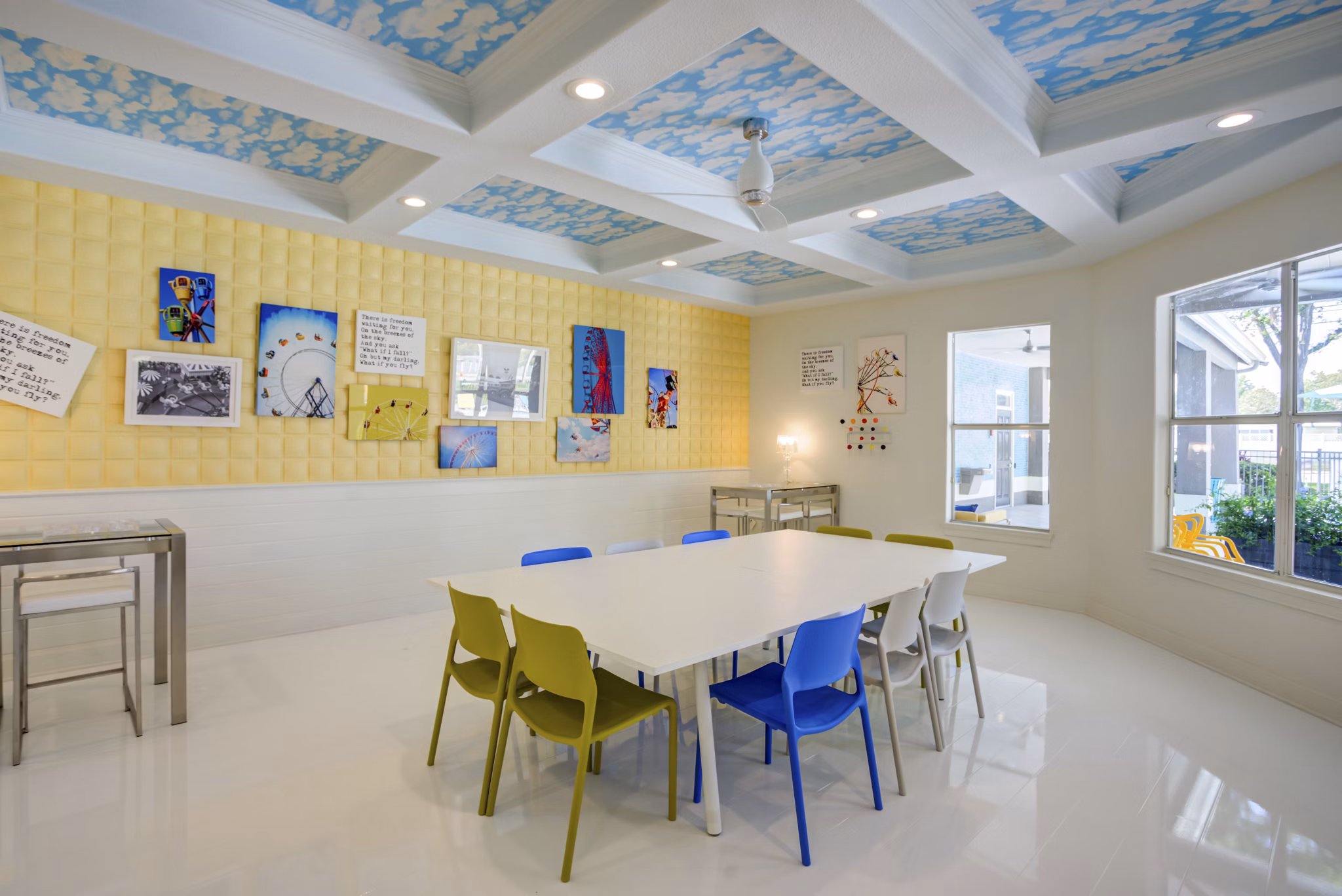 Clubhouse featuring modern design and comfortable seating at Fusion Apartments luxury community