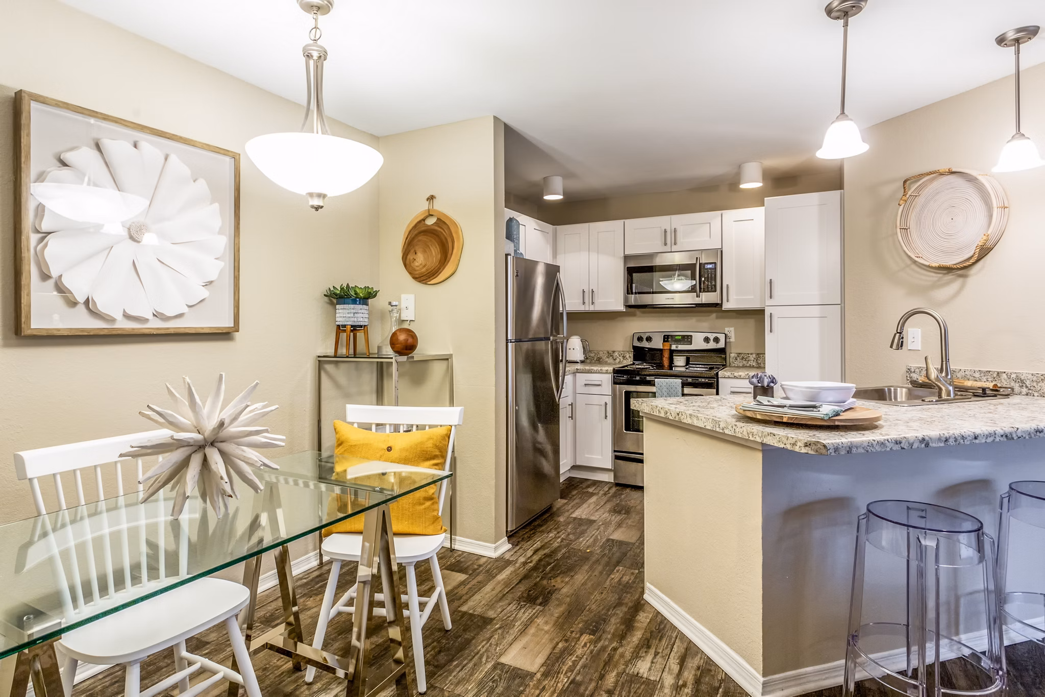 Dining area with modern decor and natural lighting at Fusion Apartments, a Greystar luxury property