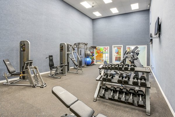 fitness center at Fusion Apartments