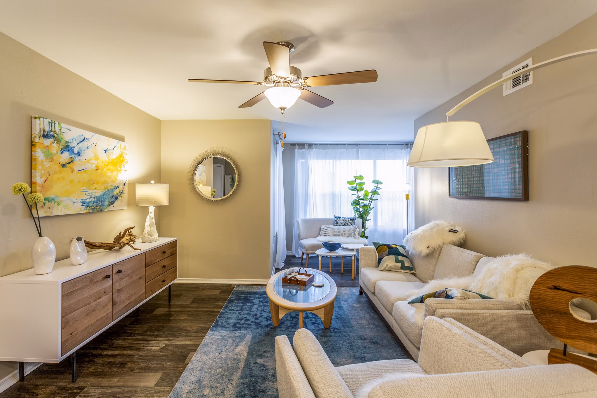 Spacious living room with modern decor at Fusion Apartments